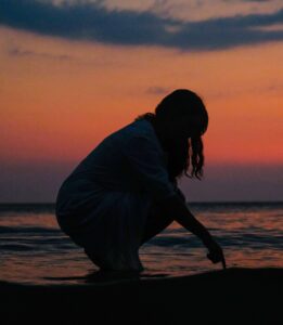 Woman touching water